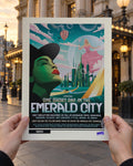 One Short Day Wicked poster held up in two hands outside a London theatre at golden hour