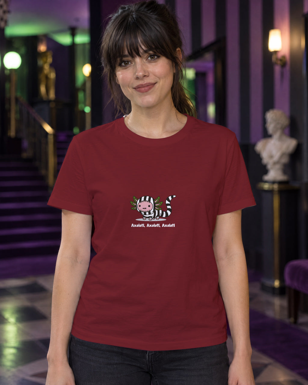 Axolotl Beetlejuice t-shirt in Burgundy, worn in a black-and-purple striped theatre foyer