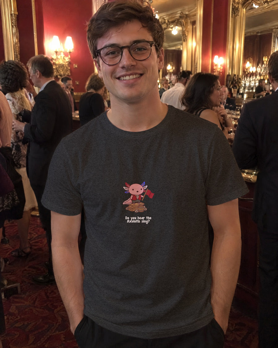Do You Hear the Axolotls Sing t-shirt in Dark Heather Grey, worn in a theatre bar
